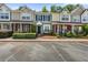 Townhouse exterior featuring well-maintained landscaping, brick accents, and a private entrance at 122 Hornby Cir, Goose Creek, SC 29445