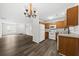 Well-lit kitchen with modern appliances, wood-look floors, and open layout at 122 Hornby Cir, Goose Creek, SC 29445