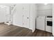 Laundry area with modern washer and dryer set and wood-look floors at 122 Hornby Cir, Goose Creek, SC 29445