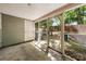 Enclosed sunroom with a screened door offers access to the backyard at 122 Hornby Cir, Goose Creek, SC 29445