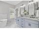 Bathroom features double sinks, modern vanity and a soaker tub at 123 Fall Creek Blvd, Summerville, SC 29483
