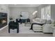 Bright and airy living room with plush seating, modern lighting, and a decorative fireplace at 123 Fall Creek Blvd, Summerville, SC 29483