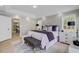 Spacious main bedroom featuring natural light, a tray ceiling, and contemporary decor that offers relaxation at 123 Fall Creek Blvd, Summerville, SC 29483
