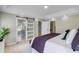 A spacious main bedroom boasts a barn door leading to the ensuite and a walk-in closet at 123 Fall Creek Blvd, Summerville, SC 29483