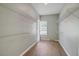 A well-lit walk-in closet features wooden floors and wire shelving at 123 Fall Creek Blvd, Summerville, SC 29483