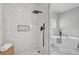 Newly renovated, this walk-in shower is tiled and ready to be enjoyed after a long day at 123 Fall Creek Blvd, Summerville, SC 29483