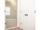Bright bedroom with a mirror showing natural light from the window at 124 Long Trail Way, Moncks Corner, SC 29461