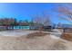 Well-maintained community pool with a white pool house and convenient parking, creating a welcoming atmosphere for residents at 124 Long Trail Way, Moncks Corner, SC 29461