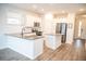 Well-lit kitchen featuring granite countertops, stainless steel appliances, and modern cabinetry at 124 Long Trail Way, Moncks Corner, SC 29461