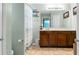 Clean, well-lit bathroom includes shower, vanity with storage, and medicine cabinet at 129 Mockernut Dr, Ladson, SC 29456