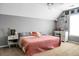 Comfortable bedroom featuring a sloped ceiling, neutral walls, carpet, and a double bed with a decorative quilt at 129 Mockernut Dr, Ladson, SC 29456