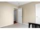 Neutral bedroom with beige walls, neutral carpet, ceiling fan, and white doors at 129 Mockernut Dr, Ladson, SC 29456