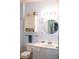 Cozy bathroom features a vanity, round mirror, and nautical décor at 1300 Park West Blvd # 919, Mount Pleasant, SC 29466