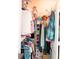 Well organized walk-in closet with clothing racks and shoe shelves at 1300 Park West Blvd # 919, Mount Pleasant, SC 29466