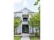 Well maintained apartment complex exterior with stairs and palm trees at 1300 Park West Blvd # 919, Mount Pleasant, SC 29466