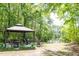 Relaxing gazebo near a tranquil lake offering a peaceful retreat within the community at 1300 Park West Blvd # 919, Mount Pleasant, SC 29466