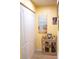Hallway with cream colored walls, carpeted flooring, and unique wall art at 1300 Park West Blvd # 919, Mount Pleasant, SC 29466