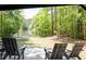 Scenic lake view from community lounge seating, perfect for relaxing outdoors at 1300 Park West Blvd # 919, Mount Pleasant, SC 29466
