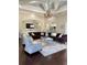 Inviting living room featuring comfortable seating, a decorative chandelier and a large flat screen television at 1300 Park West Blvd # 919, Mount Pleasant, SC 29466