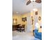 Bright living room with crown molding, carpeted flooring, ceiling fan, and an ample amount of natural light at 1300 Park West Blvd # 919, Mount Pleasant, SC 29466