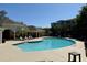 Inviting community pool with lounge chairs and nearby clubhouse at 1300 Park West Blvd # 919, Mount Pleasant, SC 29466