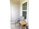 Cozy front porch seating with views of the entryway at 1300 Park West Blvd # 919, Mount Pleasant, SC 29466