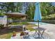 Beautiful backyard featuring a gazebo, in-ground pool, patio furniture, and mature trees at 132 E Hartwick Ln, Goose Creek, SC 29445