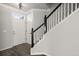 Inviting foyer with hardwood floors, a staircase, and a white front door at 132 E Hartwick Ln, Goose Creek, SC 29445