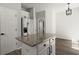 Kitchen island featuring granite countertops and stainless steel appliances at 132 E Hartwick Ln, Goose Creek, SC 29445