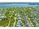 Lovely aerial shot of a neighborhood, with a view of a pond and houses nestled among the trees at 1331 Smythe St, Daniel Island, SC 29492