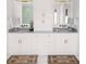 Spacious bathroom featuring dual vanities, neutral tones, and plenty of storage at 1331 Smythe St, Daniel Island, SC 29492