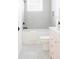 Bathroom with a tub and shower, a tile accent wall, and a pink vanity at 1331 Smythe St, Daniel Island, SC 29492
