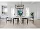 Bright dining room with modern light fixture and stylish decor at 1331 Smythe St, Daniel Island, SC 29492