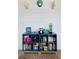 Close-up of a navy-blue bookshelf with toys and books at 1331 Smythe St, Daniel Island, SC 29492