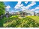 The backyard includes a playset and trampoline with a screened-in porch at 137 Clydesdale Cir, Summerville, SC 29486