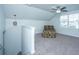 Well-lit bonus room with vaulted ceiling features a ceiling fan and decorative chair at 137 Clydesdale Cir, Summerville, SC 29486