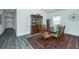 Elegant dining room with hardwood floors, a large wooden table, and a classic china cabinet at 137 Clydesdale Cir, Summerville, SC 29486