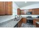 Modern kitchen featuring granite countertops, stainless steel appliances, and stylish cabinetry at 137 Clydesdale Cir, Summerville, SC 29486