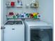 Well-organized laundry room features Maytag washer and dryer and plenty of storage at 137 Clydesdale Cir, Summerville, SC 29486