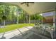 Relaxing screened porch with view of play area and backyard at 137 Clydesdale Cir, Summerville, SC 29486
