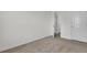 This bedroom is spacious with neutral carpet and a single door at 138 Sweet Cherry Ln, Summerville, SC 29486