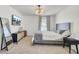 Bright bedroom featuring a stylish bed frame, contemporary furnishings, and neutral decor at 138 Sweet Cherry Ln, Summerville, SC 29486