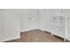 Bright and clean entryway featuring hardwood floors and a white hall tree with storage at 138 Sweet Cherry Ln, Summerville, SC 29486