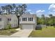 Charming two-story home featuring a gray and white exterior, complemented by a well-maintained front yard at 138 Sweet Cherry Ln, Summerville, SC 29486