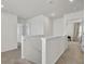 Bright hallway with neutral carpet and white trim leads to several rooms at 138 Sweet Cherry Ln, Summerville, SC 29486