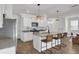 Updated kitchen boasts granite countertops, stainless steel appliances, and ample cabinet space at 138 Sweet Cherry Ln, Summerville, SC 29486