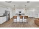 Stylish kitchen with central island, stainless appliances, and pendant lighting at 138 Sweet Cherry Ln, Summerville, SC 29486