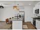 Modern kitchen featuring a breakfast bar, stainless steel appliances and stone countertops at 138 Sweet Cherry Ln, Summerville, SC 29486