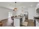 Bright kitchen with stainless steel appliances, granite countertops, and a stylish central island at 138 Sweet Cherry Ln, Summerville, SC 29486