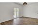 Bright living room with sliding door and wood-look flooring at 138 Sweet Cherry Ln, Summerville, SC 29486
